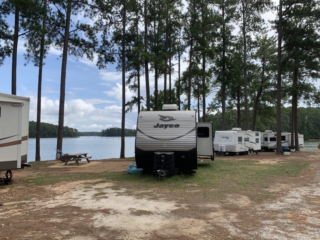 Boat slips on Lake Thurmond near lakefront RV camping at Plum Branch Yacht Club with parked scenic waterfront views in South Carolina.